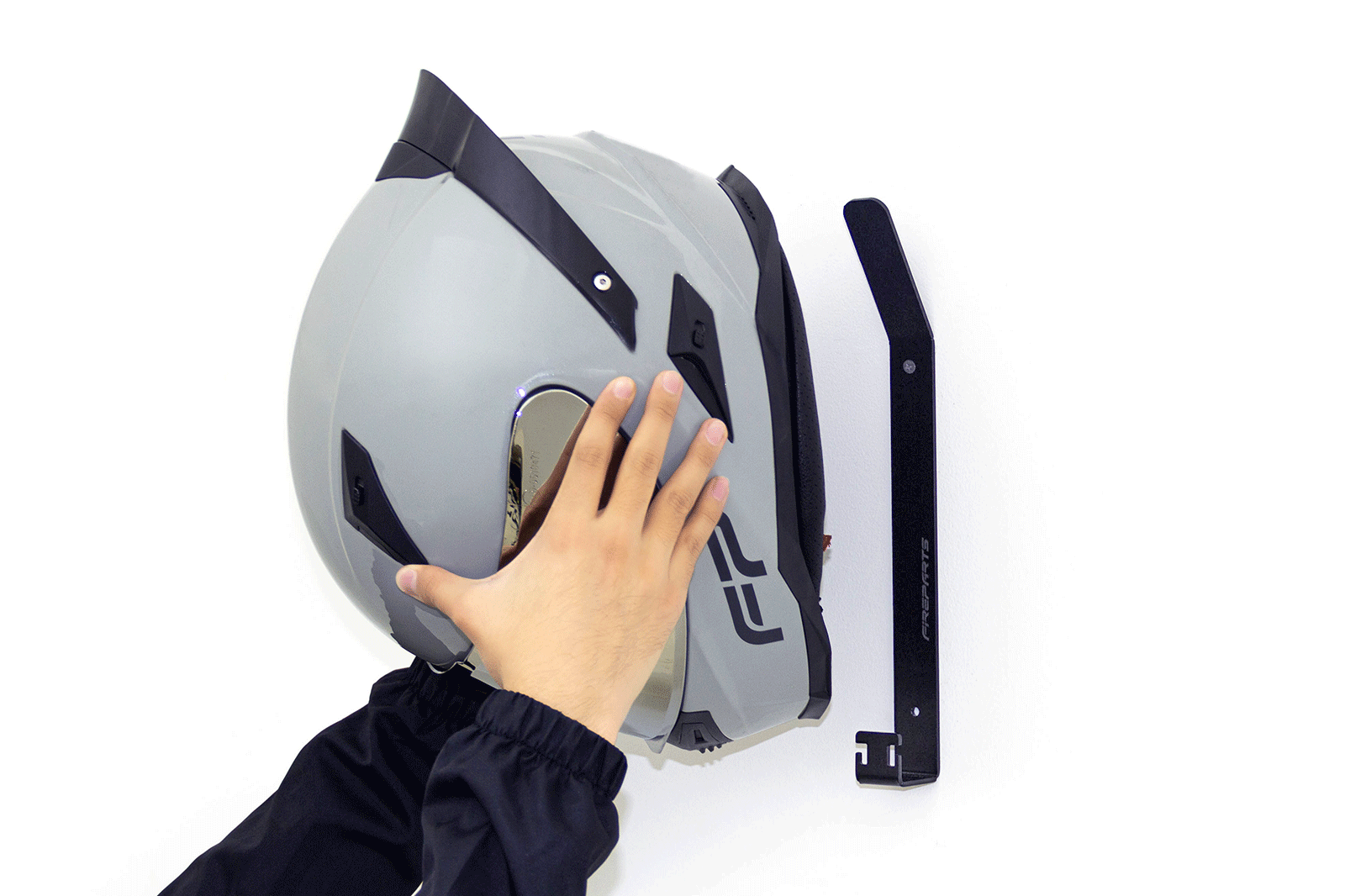 Colgador para casco de moto con forma de pistón